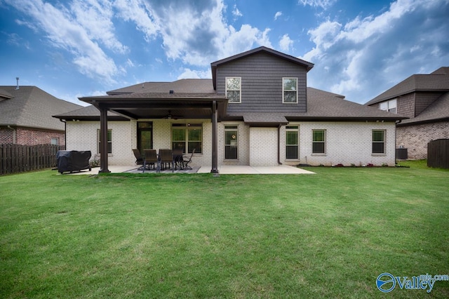 7528 Flint Crossing Cir, Owens Cross Roads, AL 35763 - rear view of house with a ceiling fan, a patio, and brick siding