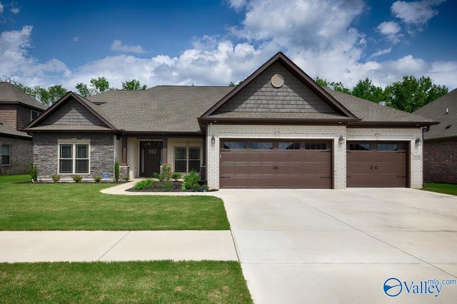 7528 Flint Crossing Cir, Owens Cross Roads, AL 35763 - craftsman-style home with an attached garage, driveway, a front yard, and brick siding