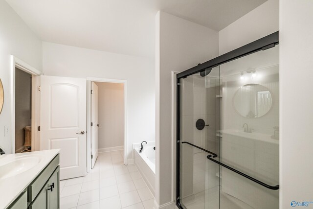 7326 Vidette Ln SE, Owens Cross Roads, AL 35763 - bathroom with vanity, a bath, tile patterned flooring, and a stall shower