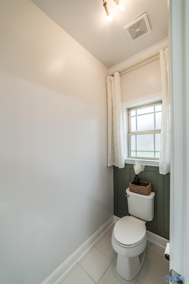 7326 Vidette Ln SE, Owens Cross Roads, AL 35763 - bathroom featuring baseboards and tile patterned flooring