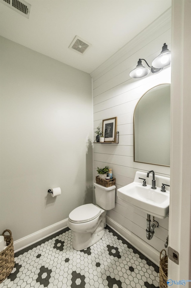 7326 Vidette Ln SE, Owens Cross Roads, AL 35763 - bathroom with wood walls and tile patterned flooring