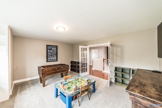 7326 Vidette Ln SE, Owens Cross Roads, AL 35763 - recreation room featuring carpet flooring and french doors