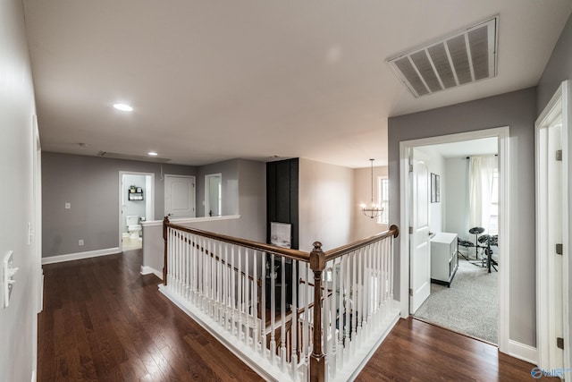7326 Vidette Ln SE, Owens Cross Roads, AL 35763 - hallway with an upstairs landing, wood finished floors, a chandelier, and recessed lighting