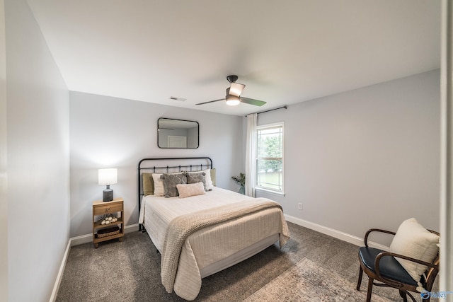 7326 Vidette Ln SE, Owens Cross Roads, AL 35763 - bedroom featuring dark carpet and ceiling fan