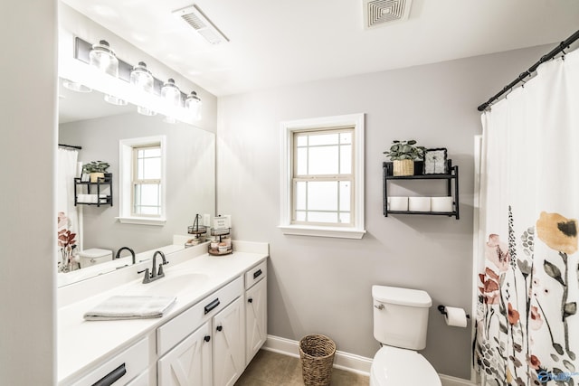 7326 Vidette Ln SE, Owens Cross Roads, AL 35763 - full bathroom with vanity, healthy amount of natural light, and tile patterned floors