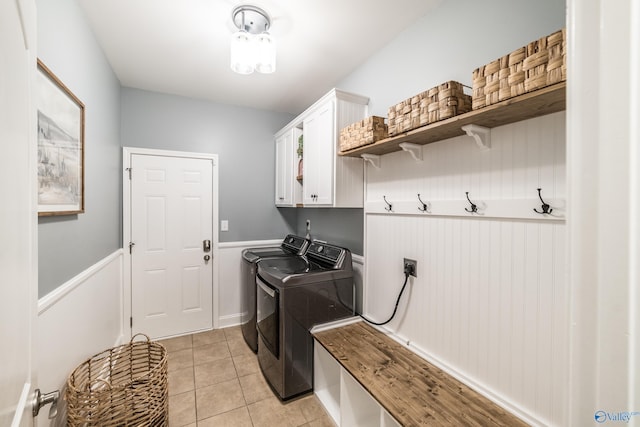 7326 Vidette Ln SE, Owens Cross Roads, AL 35763 - laundry room with cabinet space, independent washer and dryer, and light tile patterned floors