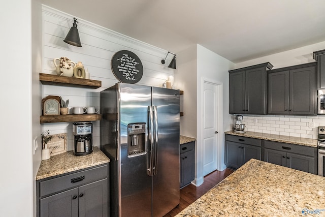 7326 Vidette Ln SE, Owens Cross Roads, AL 35763 - kitchen with stainless steel appliances, backsplash, dark wood-style flooring, light stone countertops, and open shelves