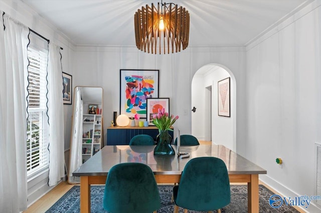 dining room with crown molding