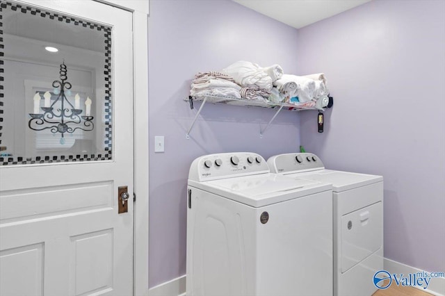 washroom featuring independent washer and dryer