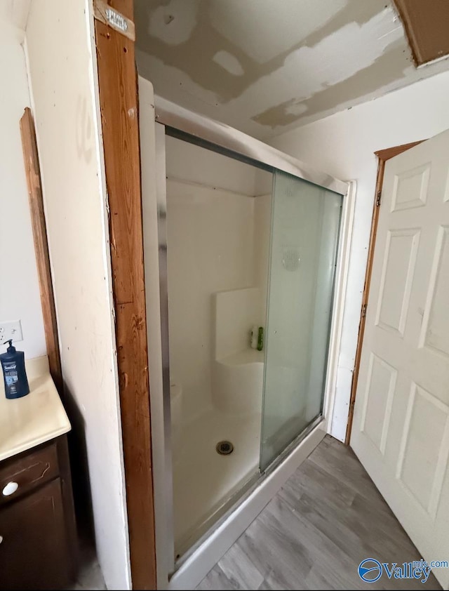 50 Hudgins Dr, Attalla, AL 35954 - full bath with a stall shower and wood finished floors