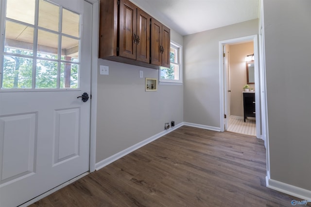 814 E Haven Dr, Glencoe, AL 35905 - laundry area featuring cabinet space, washer hookup, dark wood-style floors, and electric dryer hookup