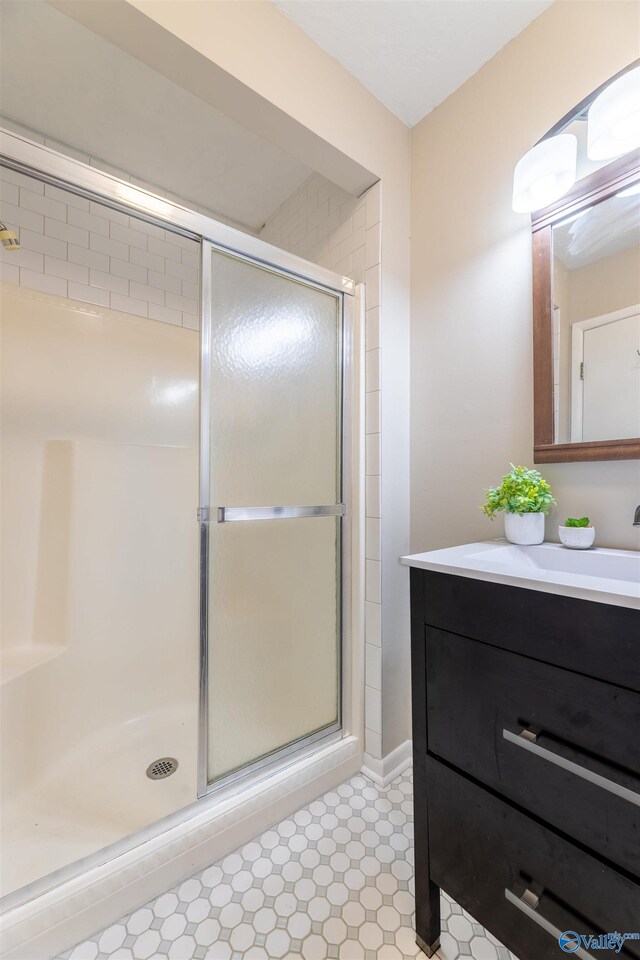 814 E Haven Dr, Glencoe, AL 35905 - bathroom featuring vanity and a stall shower