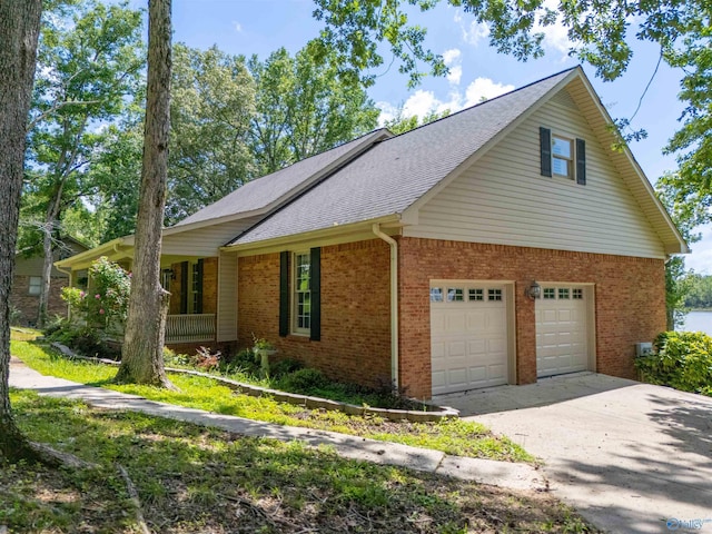 814 E Haven Dr, Glencoe, AL 35905 - view of front of property with brick siding, concrete driveway, and roof with shingles