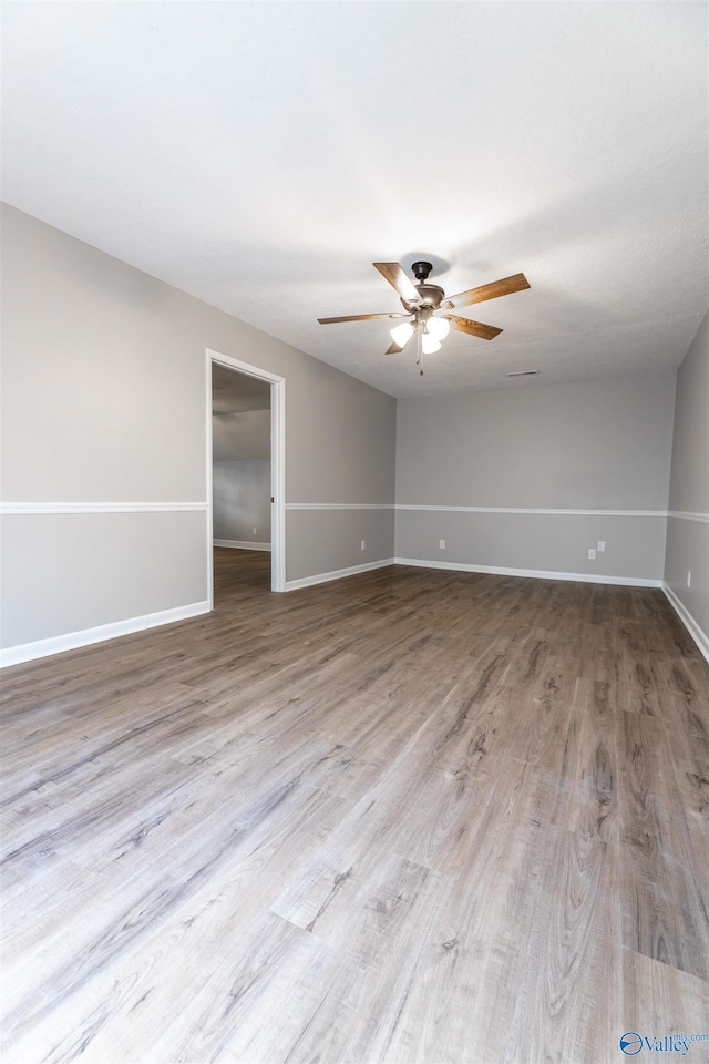 814 E Haven Dr, Glencoe, AL 35905 - empty room with ceiling fan and wood finished floors