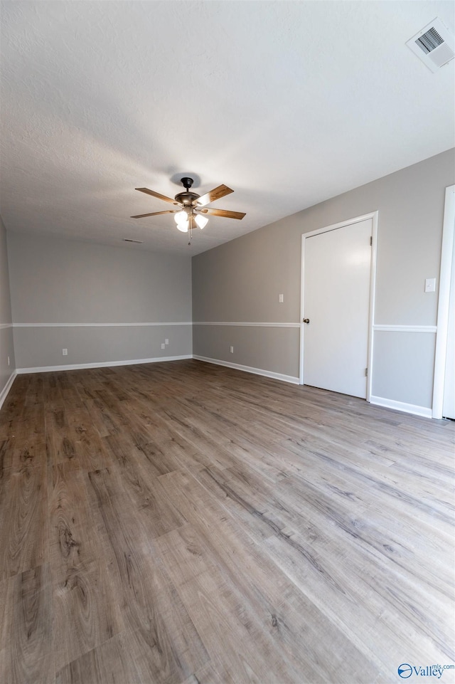 814 E Haven Dr, Glencoe, AL 35905 - spare room featuring ceiling fan and wood finished floors