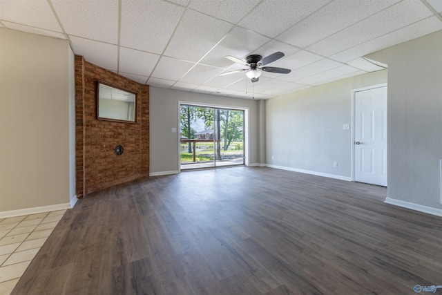 814 E Haven Dr, Glencoe, AL 35905 - unfurnished living room featuring a paneled ceiling, a ceiling fan, and wood finished floors