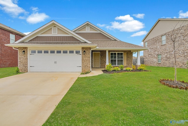 2452 Belltown Dr, Huntsville, AL 35803 - view of front of house featuring brick siding, a front yard, concrete driveway, and board and batten siding