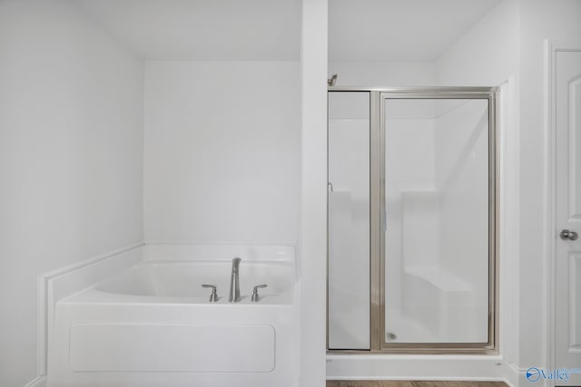 2452 Belltown Dr, Huntsville, AL 35803 - full bathroom featuring a shower stall and a garden tub