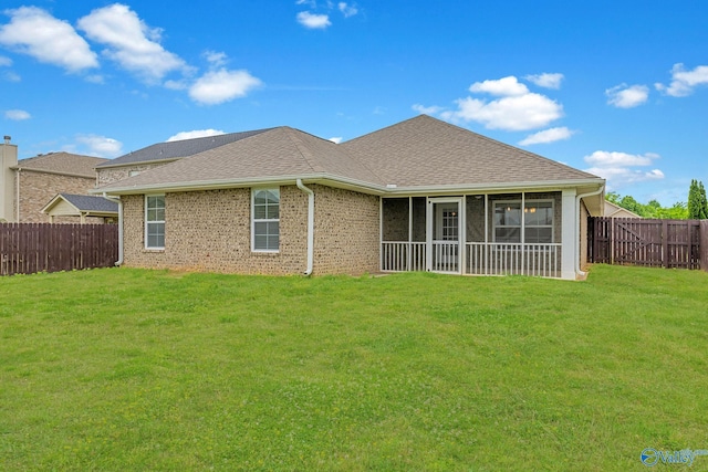 2452 Belltown Dr, Huntsville, AL 35803 - back of property with brick siding, a sunroom, and a shingled roof