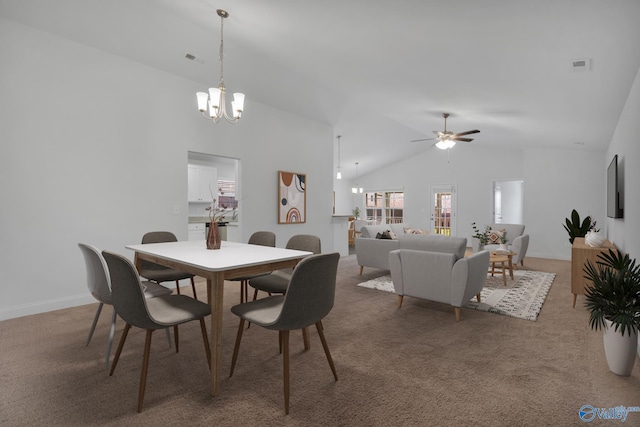 2452 Belltown Dr, Huntsville, AL 35803 - dining room with a chandelier, carpet flooring, a ceiling fan, and high vaulted ceiling