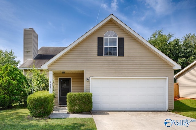 249 Knox Creek Trl NW, Madison, AL 35757 - traditional-style home with a garage, concrete driveway, a chimney, and a front yard