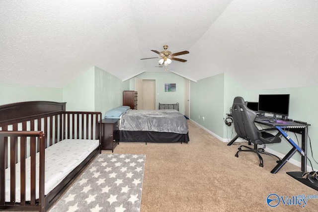 249 Knox Creek Trl NW, Madison, AL 35757 - bedroom featuring vaulted ceiling, carpet floors, a textured ceiling, a desk, and ceiling fan