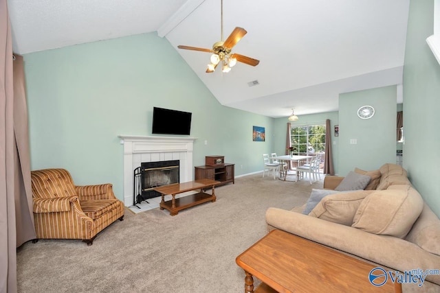 249 Knox Creek Trl NW, Madison, AL 35757 - carpeted living room with ceiling fan, high vaulted ceiling, a tiled fireplace, and beam ceiling