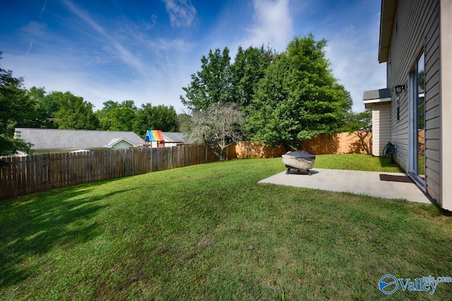 249 Knox Creek Trl NW, Madison, AL 35757 - fenced backyard featuring a patio area