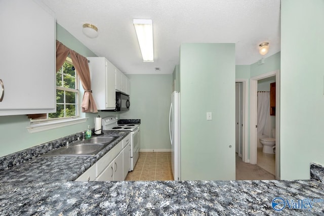 249 Knox Creek Trl NW, Madison, AL 35757 - kitchen featuring white appliances, white cabinets, and light tile patterned floors