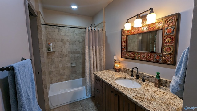 bathroom with vanity, shower / bathtub combination with curtain, and tile patterned flooring