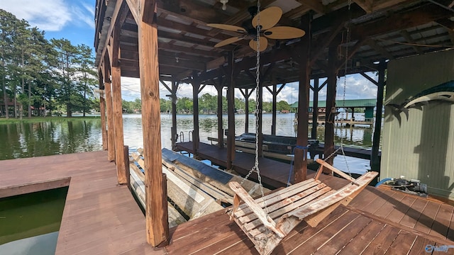 dock area featuring a water view and boat lift