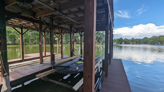 dock area with a water view