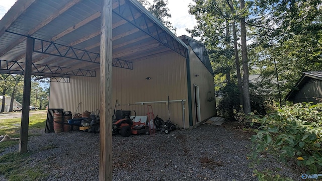 view of property exterior featuring a carport