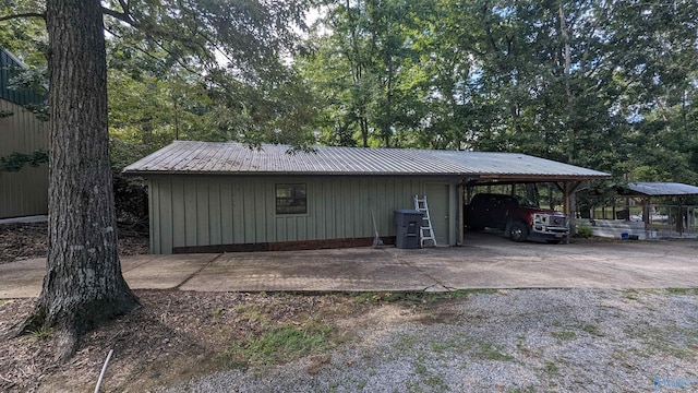 view of outdoor structure with a carport