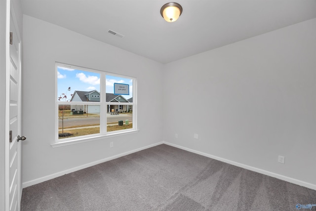 spare room with carpet flooring