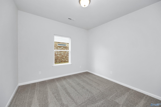 empty room featuring carpet flooring