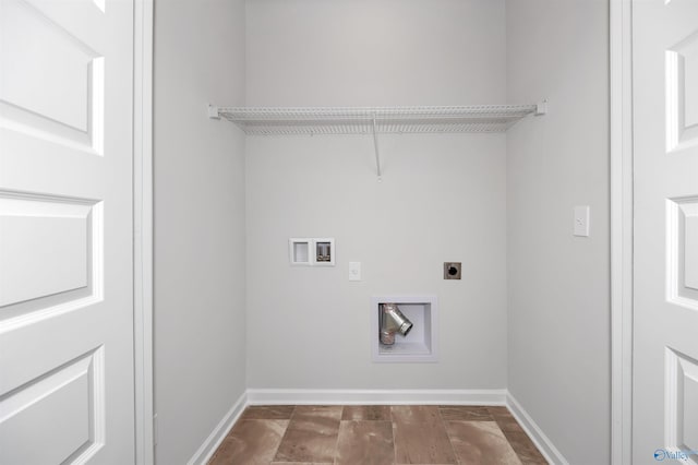 laundry room featuring electric dryer hookup and washer hookup