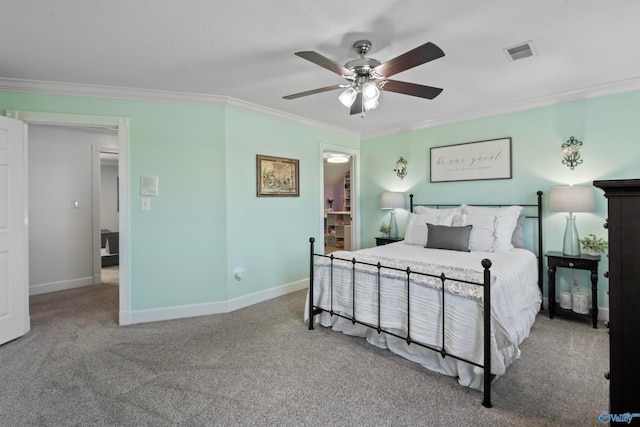 carpeted bedroom with crown molding and ceiling fan