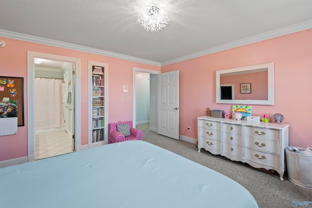 bedroom with connected bathroom, ornamental molding, carpet floors, and a textured ceiling