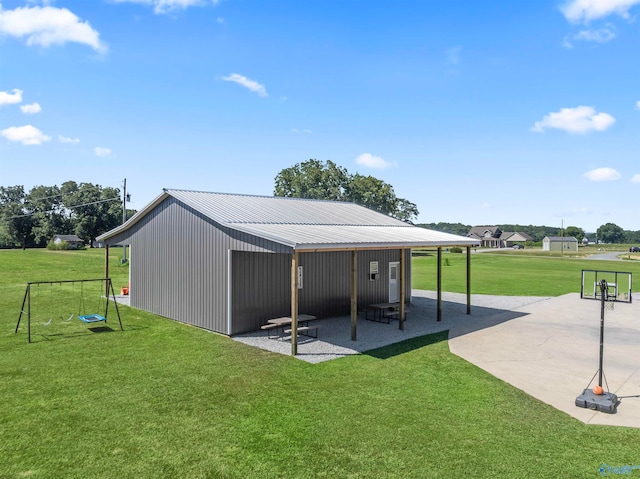 view of outdoor structure with a yard