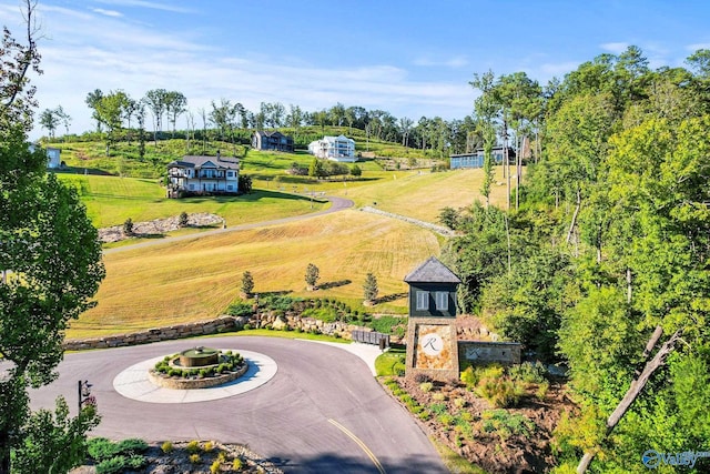 birds eye view of property with a rural view