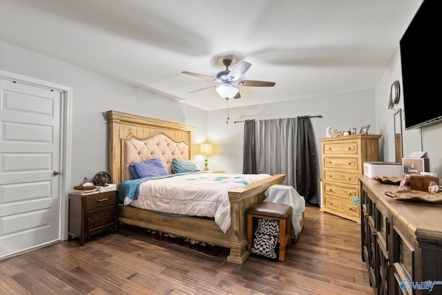 bedroom featuring ceiling fan and wood-type flooring