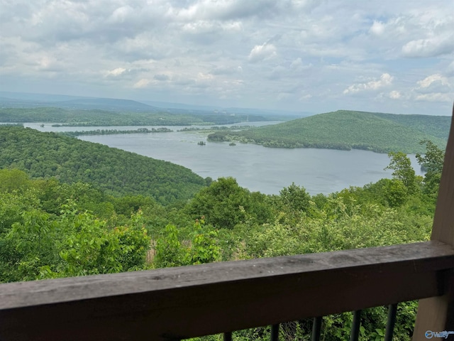 mountain view featuring a water view and a view of trees