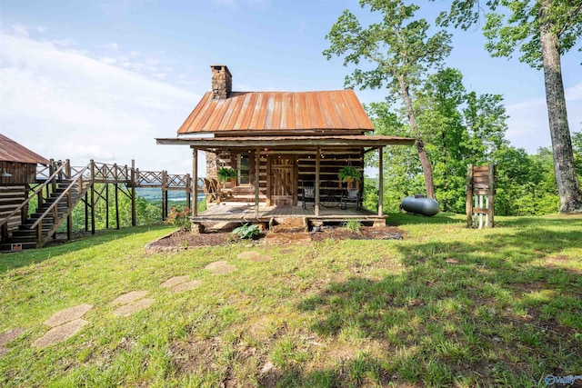 view of outbuilding featuring stairway