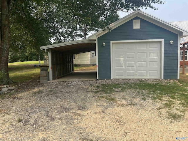 415 County Road 355, Leesburg, AL 35983 - garage featuring a detached garage and gravel driveway
