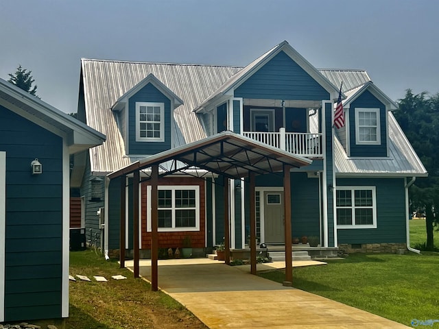 415 County Road 355, Leesburg, AL 35983 - view of front of home with a balcony, a metal roof, a front lawn, and driveway