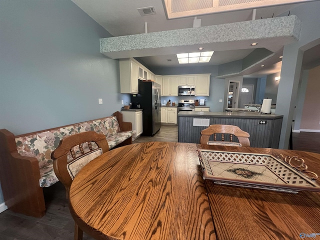 415 County Road 355, Leesburg, AL 35983 - dining space with dark wood-type flooring