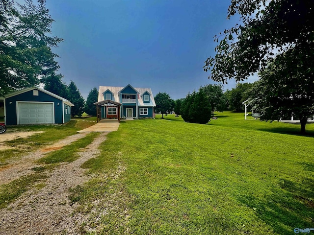 415 County Road 355, Leesburg, AL 35983 - traditional-style home featuring driveway, an outdoor structure, a front lawn, and a garage