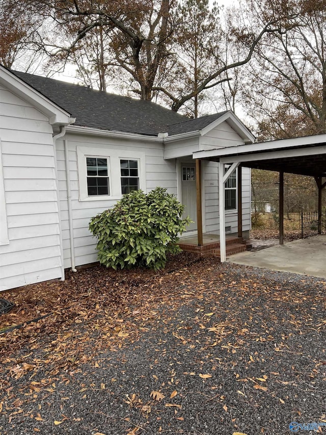 view of front of house featuring a carport