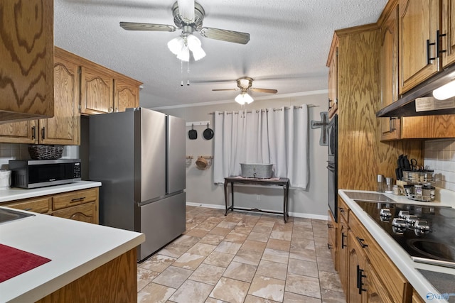 kitchen featuring brown cabinetry, crown molding, stainless steel appliances, and decorative backsplash